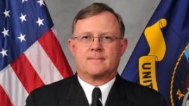 Rear Adm. Timothy Giardina is accused of counterfeiting casino chips to support a gambling habit.